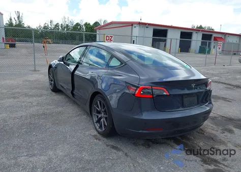 2021 Tesla Model 3 Standard Range Plus Rear-Wheel Drive from USA, damaged, VIN 5YJ3E1EA3MF058374